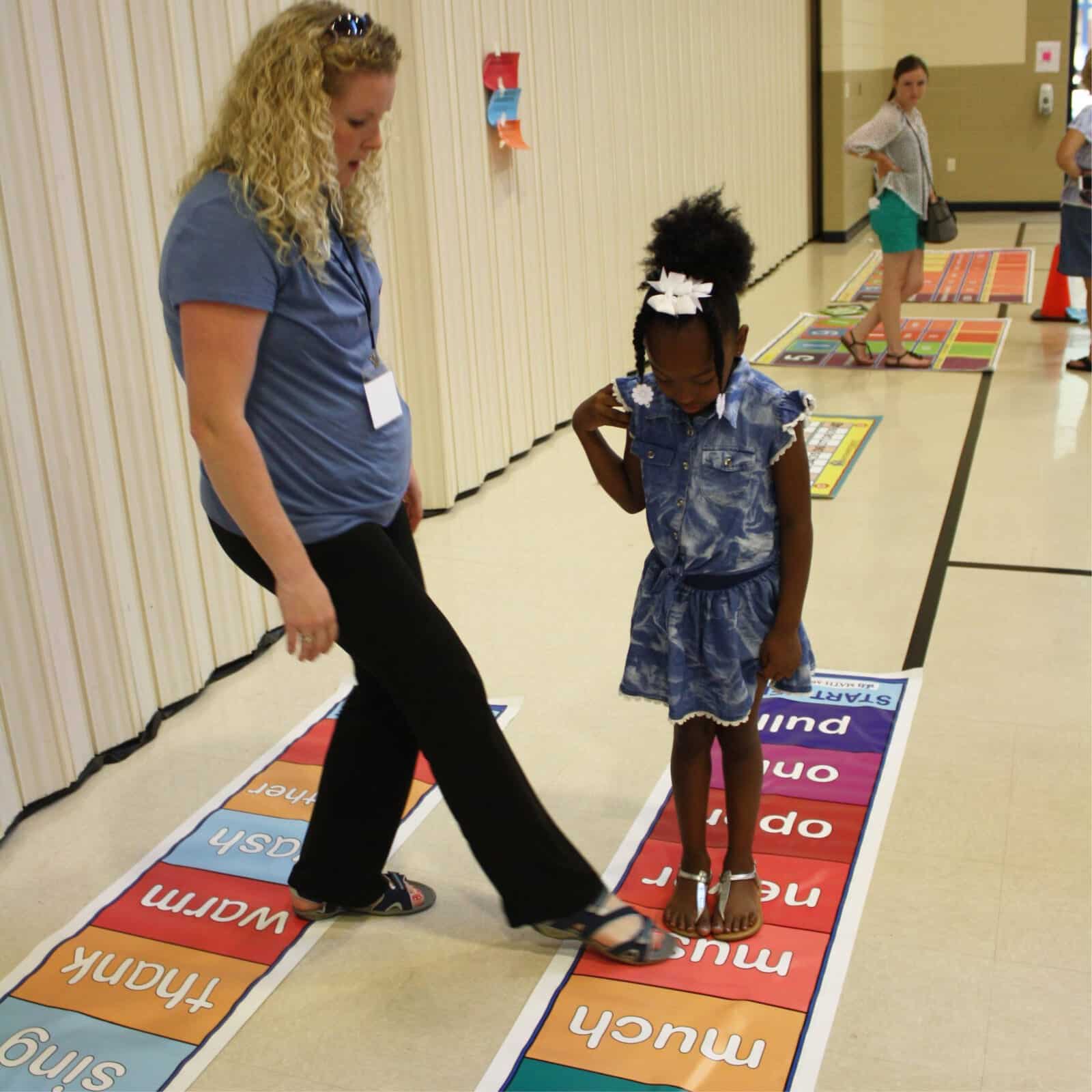 Student using Word Hop mat